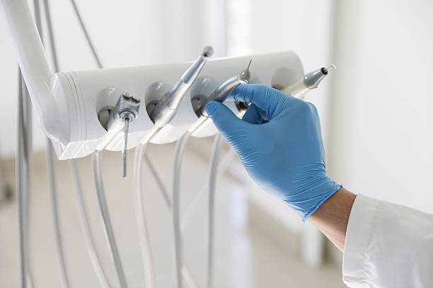 Professional Dental technician working in Farmland, IN